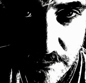 Black and white portrait, half shadowed face.